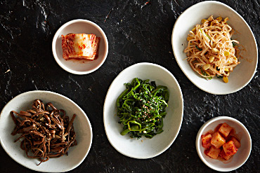 Bowls of Korean side dishes